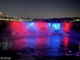 Haiti - May 18, 2022 : Niagara Falls illuminated with the colors of the flag of Haiti (Live camera)