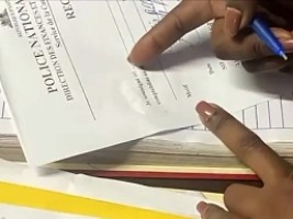 Haiti - Social : Presentation of the first compensation check for police victims on duty (Video)